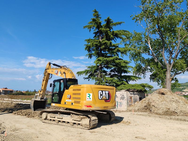 Tracked excavator working on a construction site
